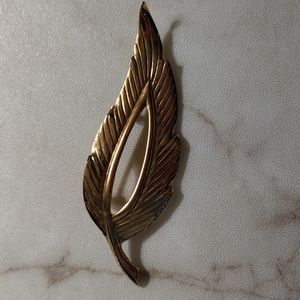Gold leaf brooch.